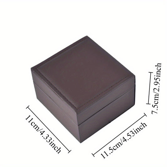 Brown one-watch presentation case with a hinged lid and fitted cushion on a white background.