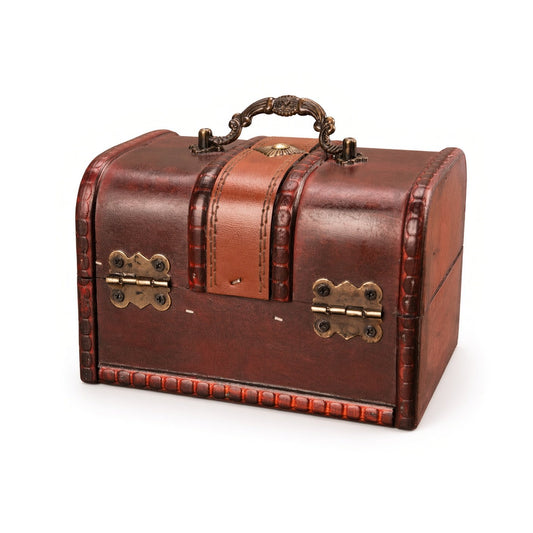 Back of reddish brown wooden chest showing two brass hinges and carry handle
