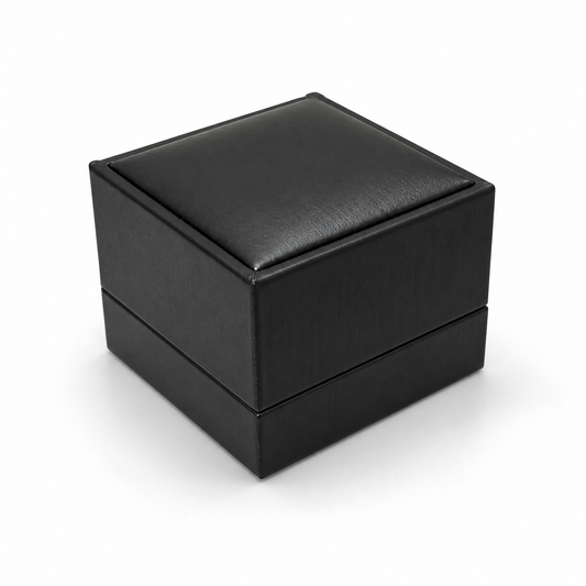 Closed black PU ring box on a white background