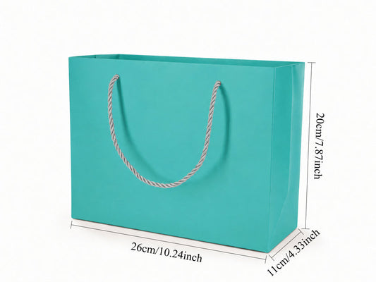 Front view of tiffany blue jewelry store gift tote bag with rope handles, 10.25 × 4.25 × 7.75 in