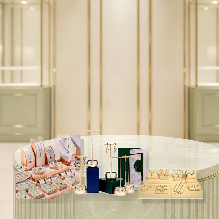 Custom jewelry display sets with bright photographic lighting on a showroom plinth