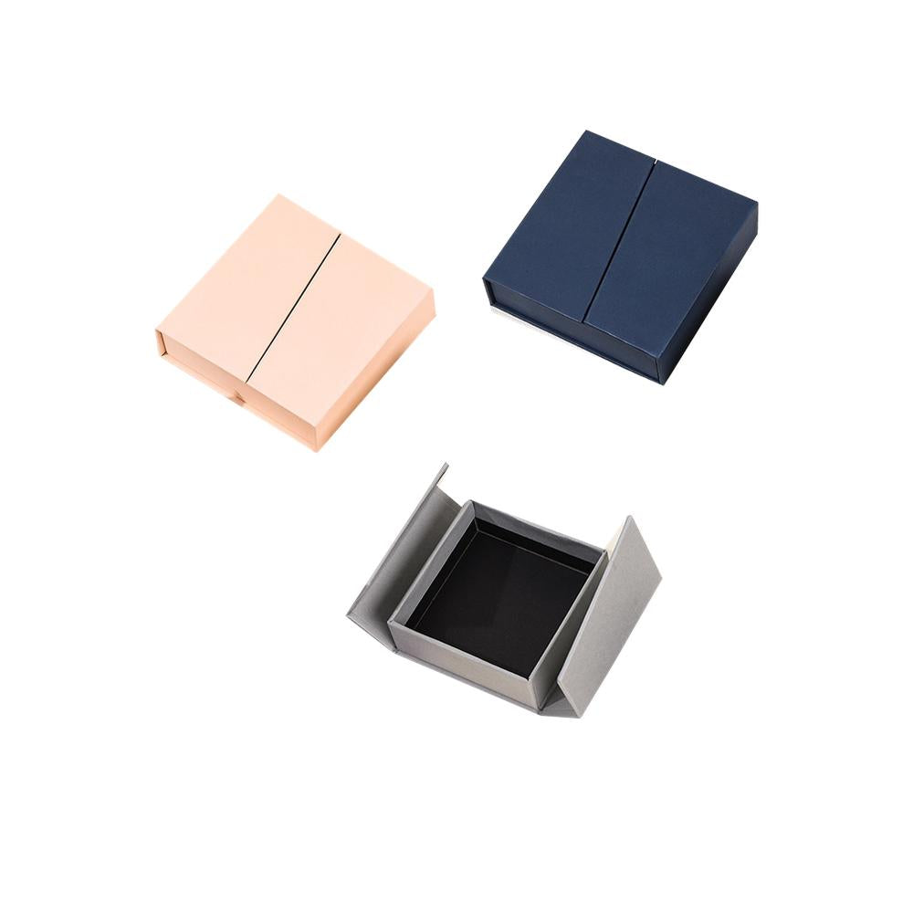 Custom double-opening magnetic jewelry boxes in multiple colors and sizes on a pure white background