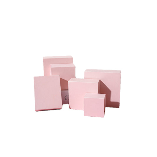 Pearl pink magnetic jewelry box on a pure white background