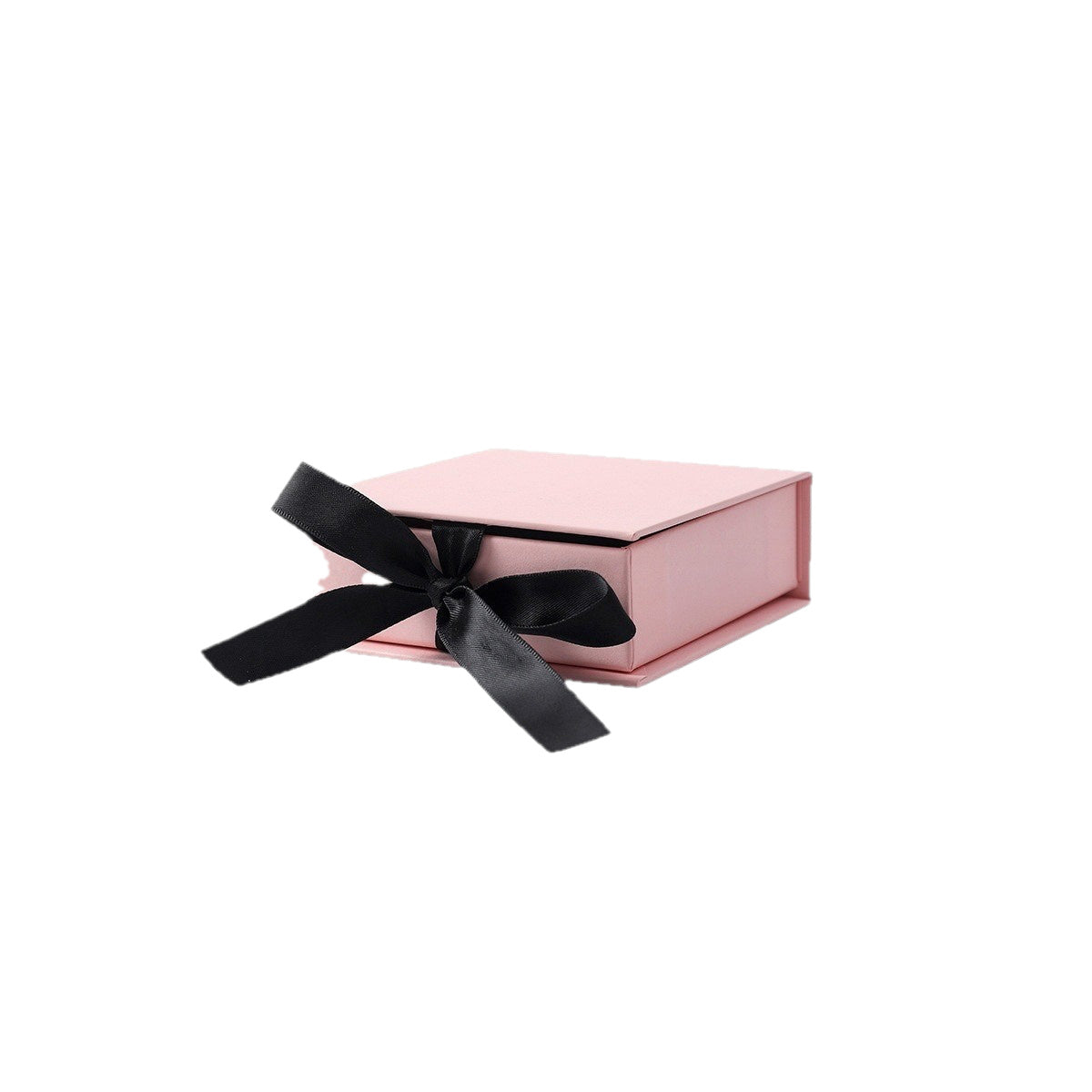 Pink ribbon-closure flip-top jewelry box on a pure white background