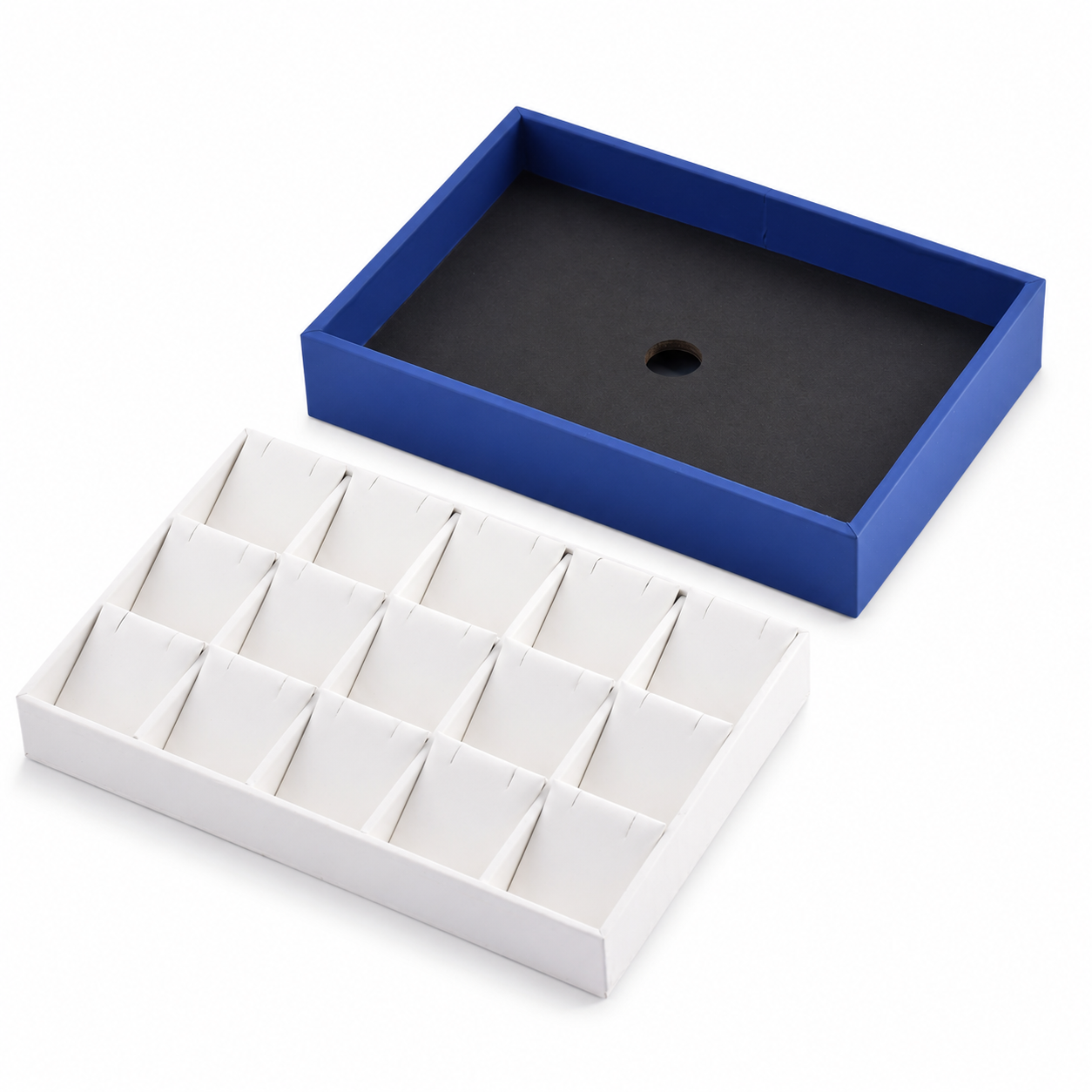White 15-section earring display insert inside a blue jewelry tray