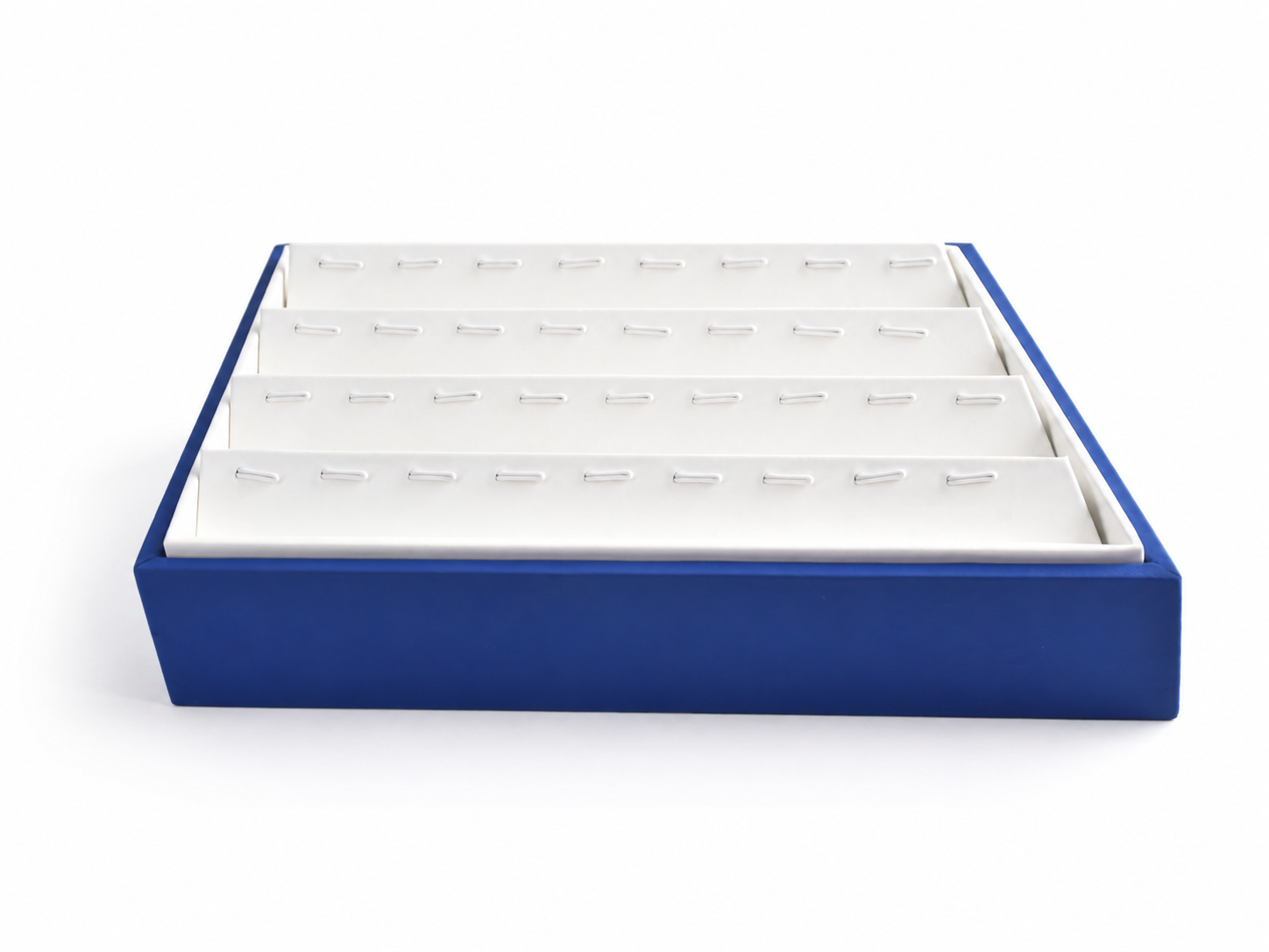 White slotted pendant presentation insert inside a blue jewelry tray