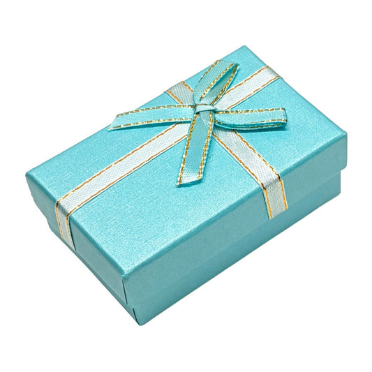 Closed Tiffany blue B2632 bow jewelry gift box on a pure white background