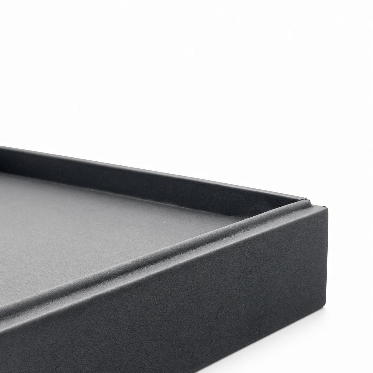 Black frame detail on silver 56-slot ring display tray