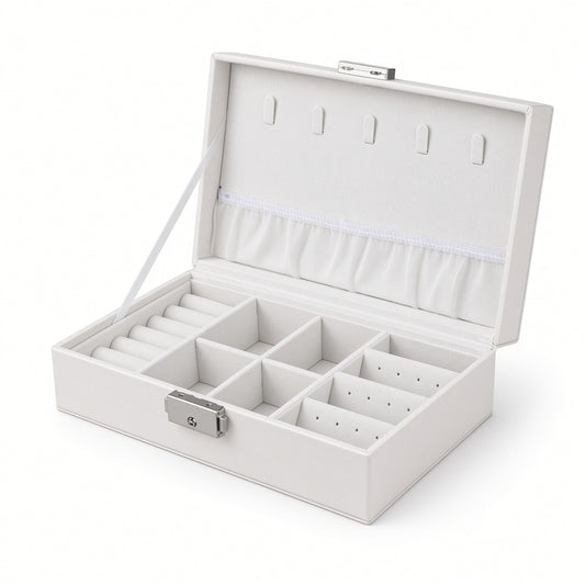 White compact jewelry box with lock open, showing necklace hooks and divided compartments