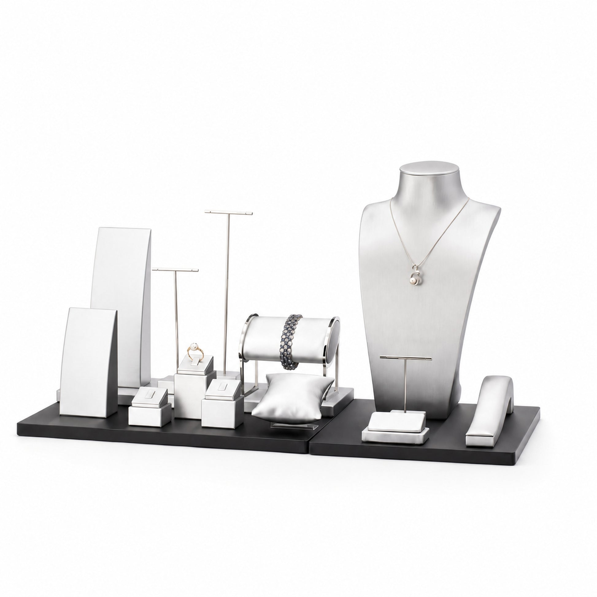 Custom Black and White Multi-Level Jewelry Display Set shown without the backboard in a black and white arrangement with jewelry visible on the display pieces