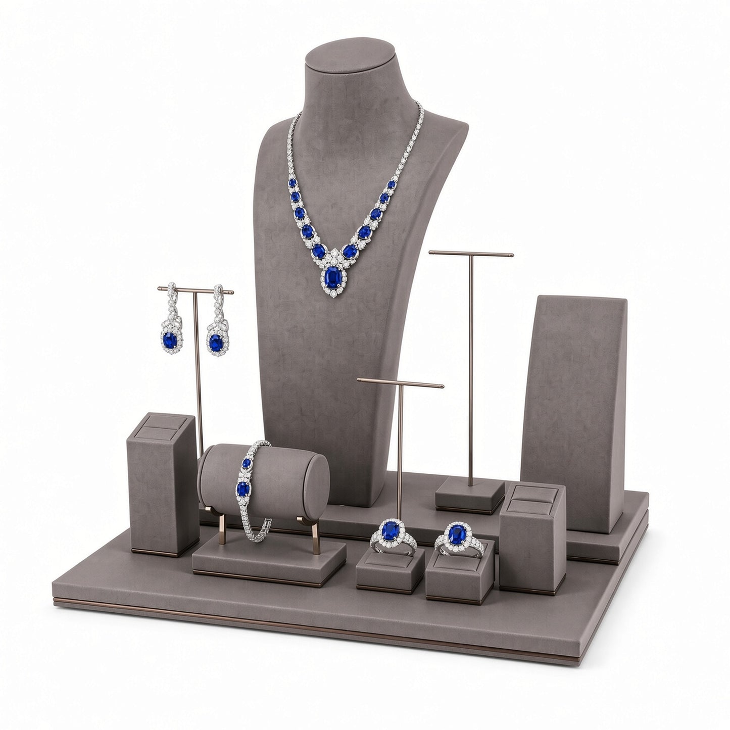 Custom Gray Coordinated Jewelry Retail Display Set without the backboard, styled with necklaces, earrings, rings and bracelets across the coordinated display pieces