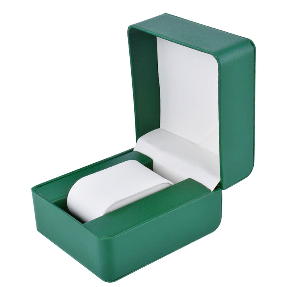 Open dark green single watch display box with a fitted white cushion on a plain background.