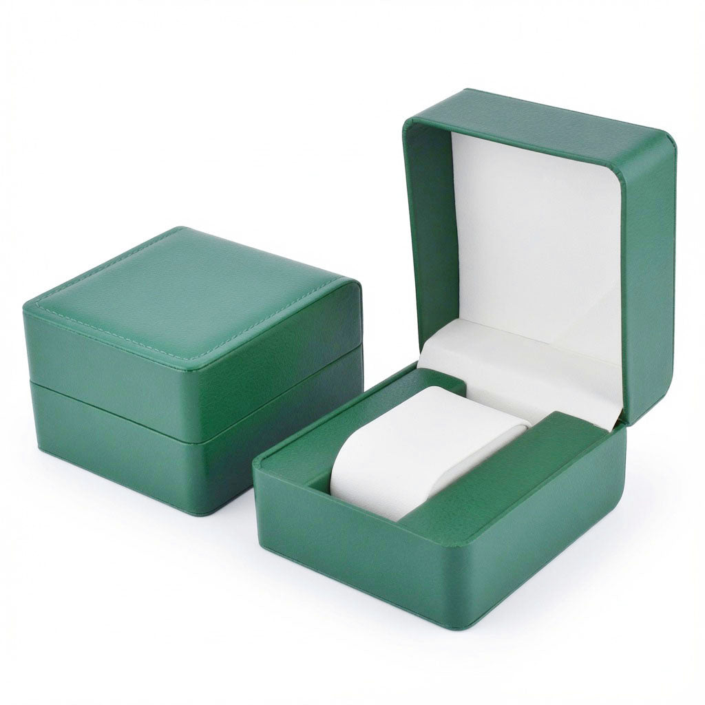 Jeweller Buy compact wristwatch packaging box with green exterior and padded white holder.