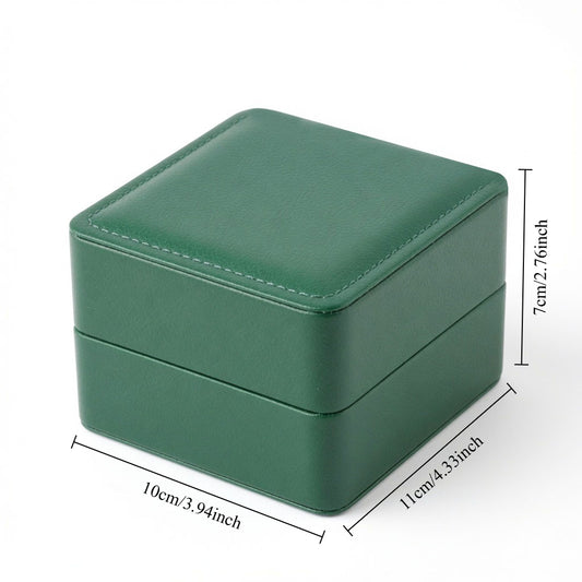 Deep green one-watch presentation case featuring a hinged lid and bright white interior.
