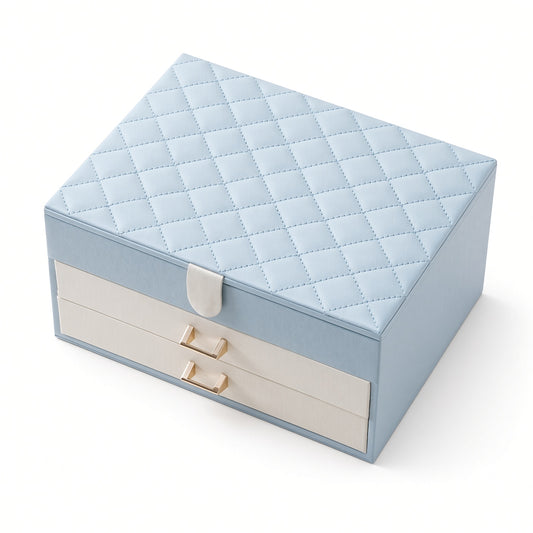 Light blue quilted jewelry case with ivory drawer fronts and magnetic closure tab