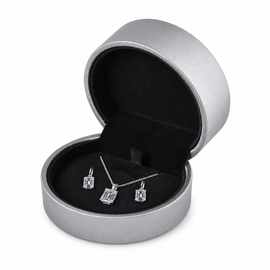 Open gray PU pendant and earring jewelry box with emerald-cut diamond wedding jewelry