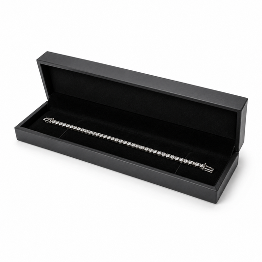 Open black PU bracelet box displaying a diamond tennis bracelet