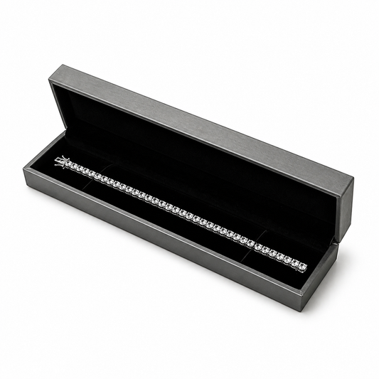 Open gray PU bracelet box displaying a diamond tennis bracelet