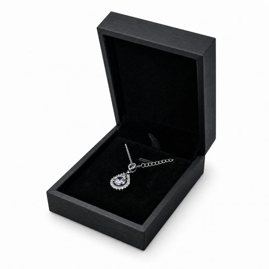 Black PU pendant box open in three-quarter view with teardrop pendant necklace