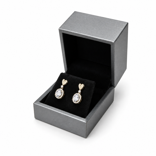 Open gray PU earring box displaying diamond drop earrings