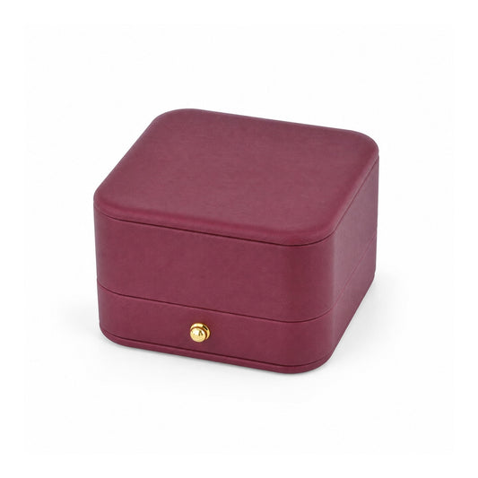 magenta PU pendant box, closed exterior in a three-quarter view.