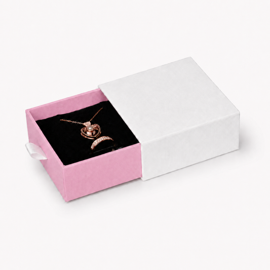 Pink pull out drawer jewelry box for rings, earrings, studs, pendants and compact necklaces — main product view.