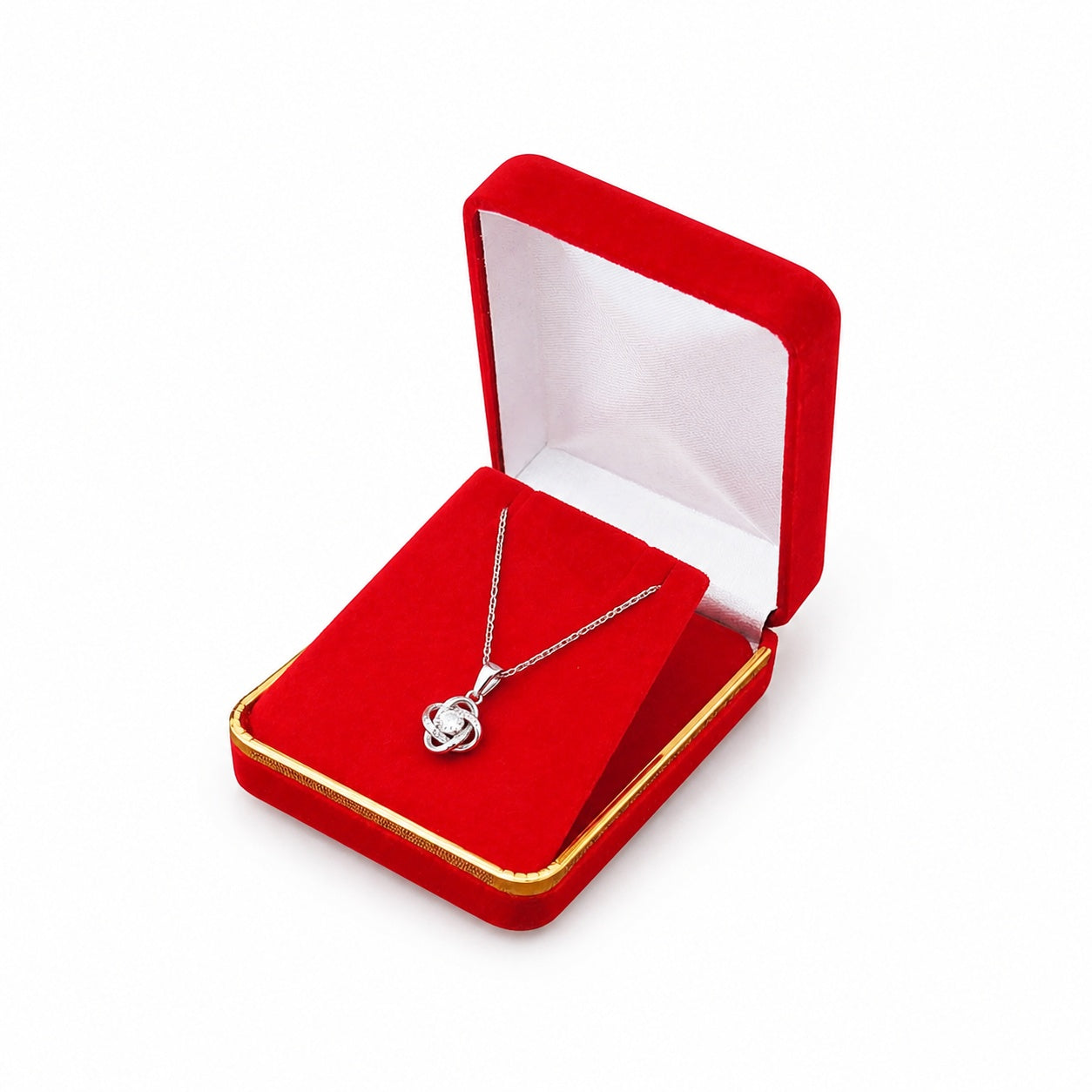 Red Rectangular Velvet Pendant Boxes with Gold Trim shown as one open box with jewelry display props