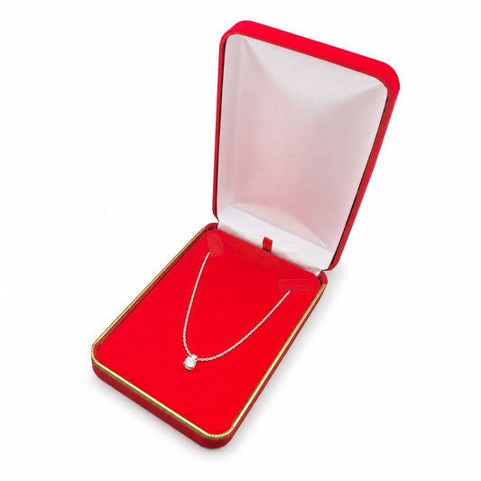 Red Velvet Necklace Boxes with Gold Trim shown as one open box with jewelry display props