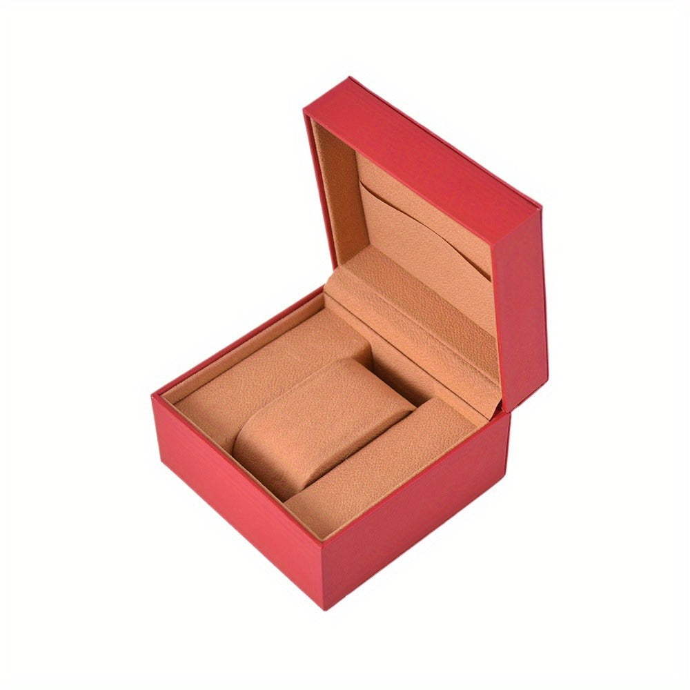 Jeweller Buy red timepiece box featuring a structured interior and removable watch pillow.