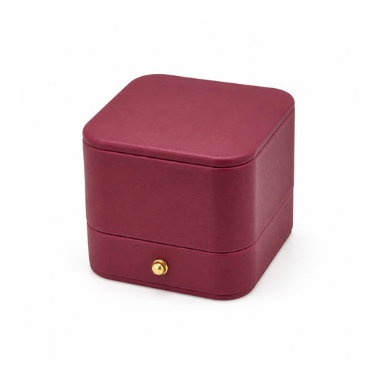 magenta PU ring box, closed exterior in a three-quarter view.