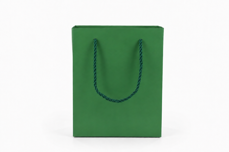 Front view of green jewelry store gift tote bag with rope handles, 6.25 × 3.5 × 7.75 in