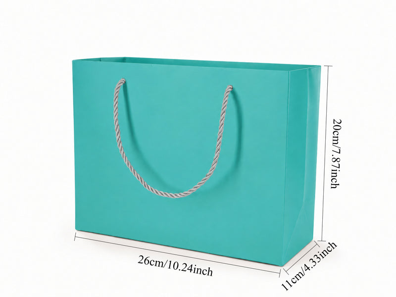 Front view of tiffany blue jewelry store gift tote bag with rope handles, 10.25 × 4.25 × 7.75 in