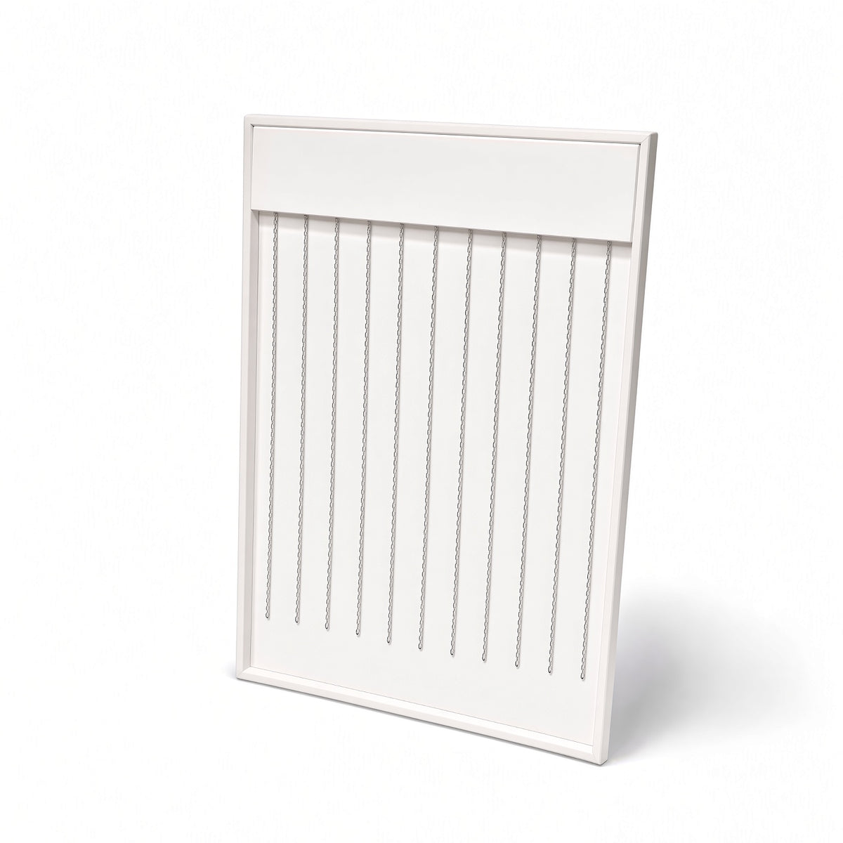 White necklace display board upright with chains